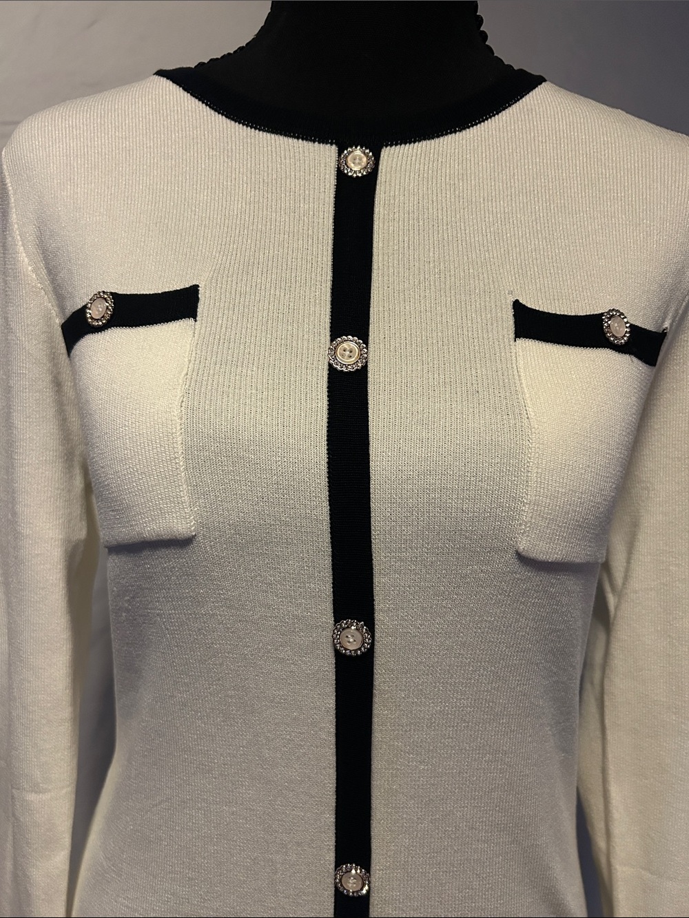 Cream Long-Sleeve Knit Dress with Black Trim and Decorative Buttons